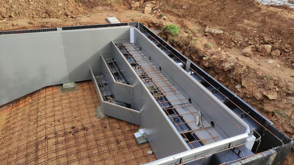 Rénovation de piscine avec la construction d'un escalier par Aid'eau